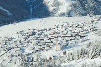 Obertilliach aus der Luft.  • © TVB Osttirol, Elias Bachmann